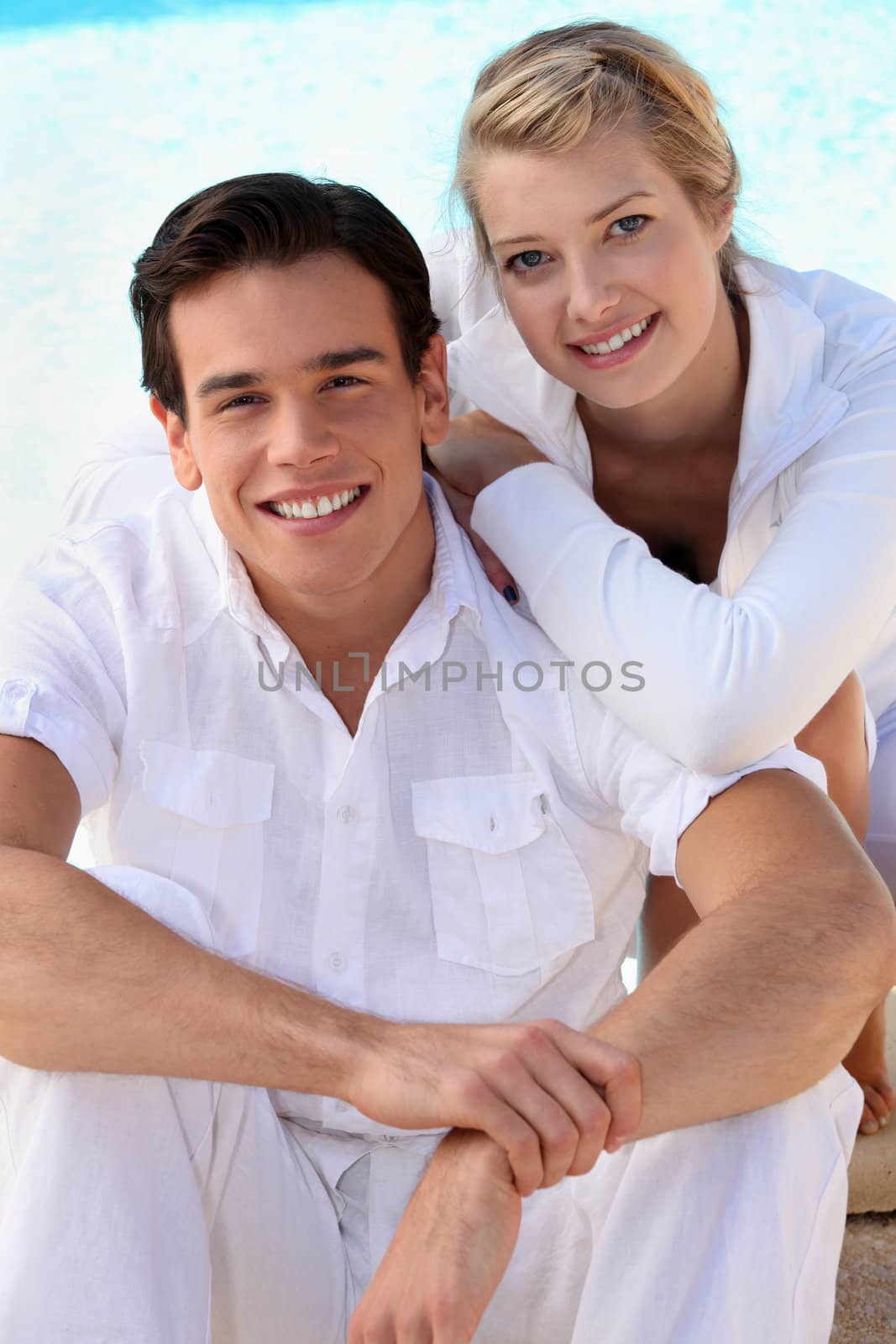 Young couple in white by phovoir