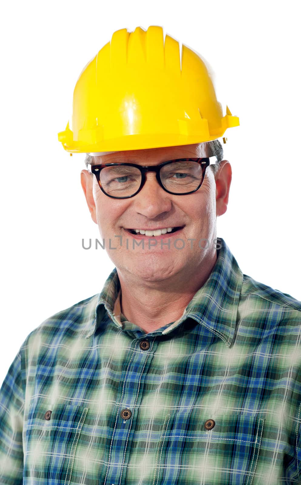 Closeup of senior architect in hardhat ssmiling in front of camera