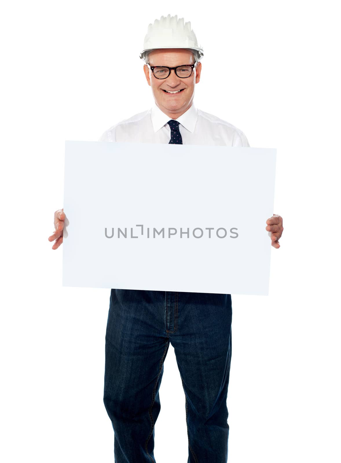 Senior architect holding blank billboard wearing white hardhat