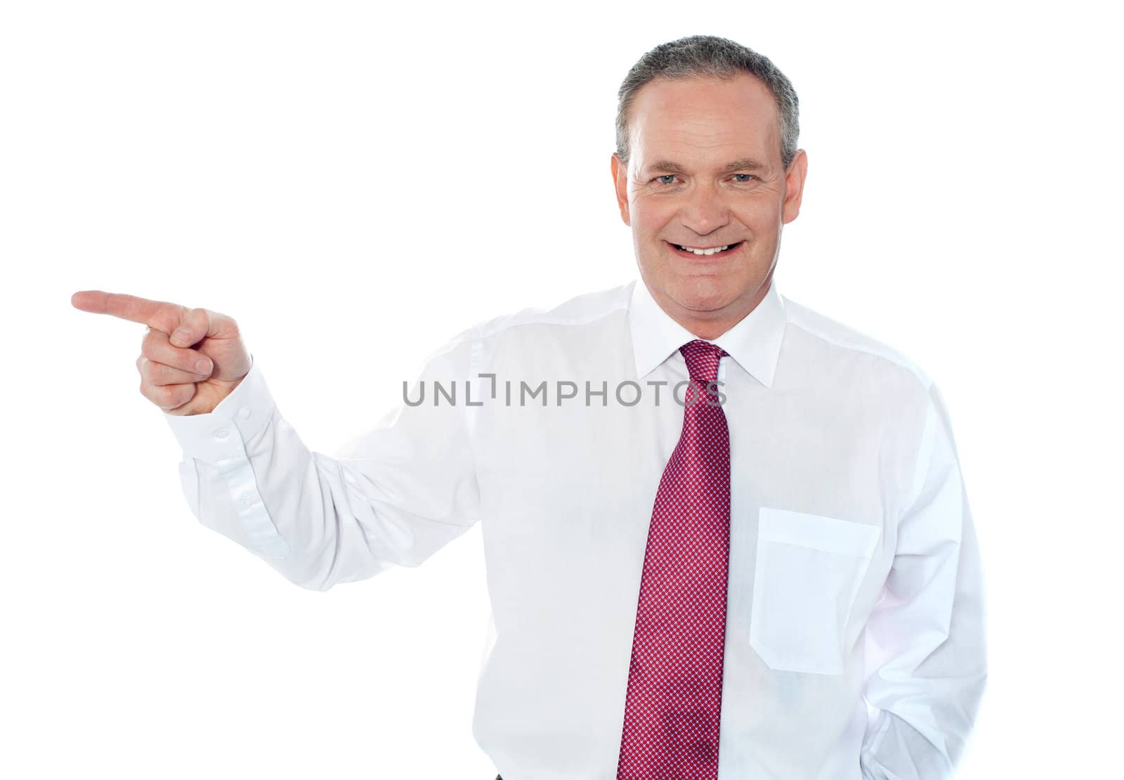 Old caucasian male executive pointing away isolated on white background