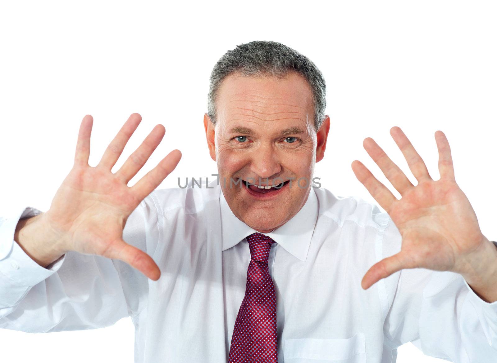 Excited businessman showing his palms to camera