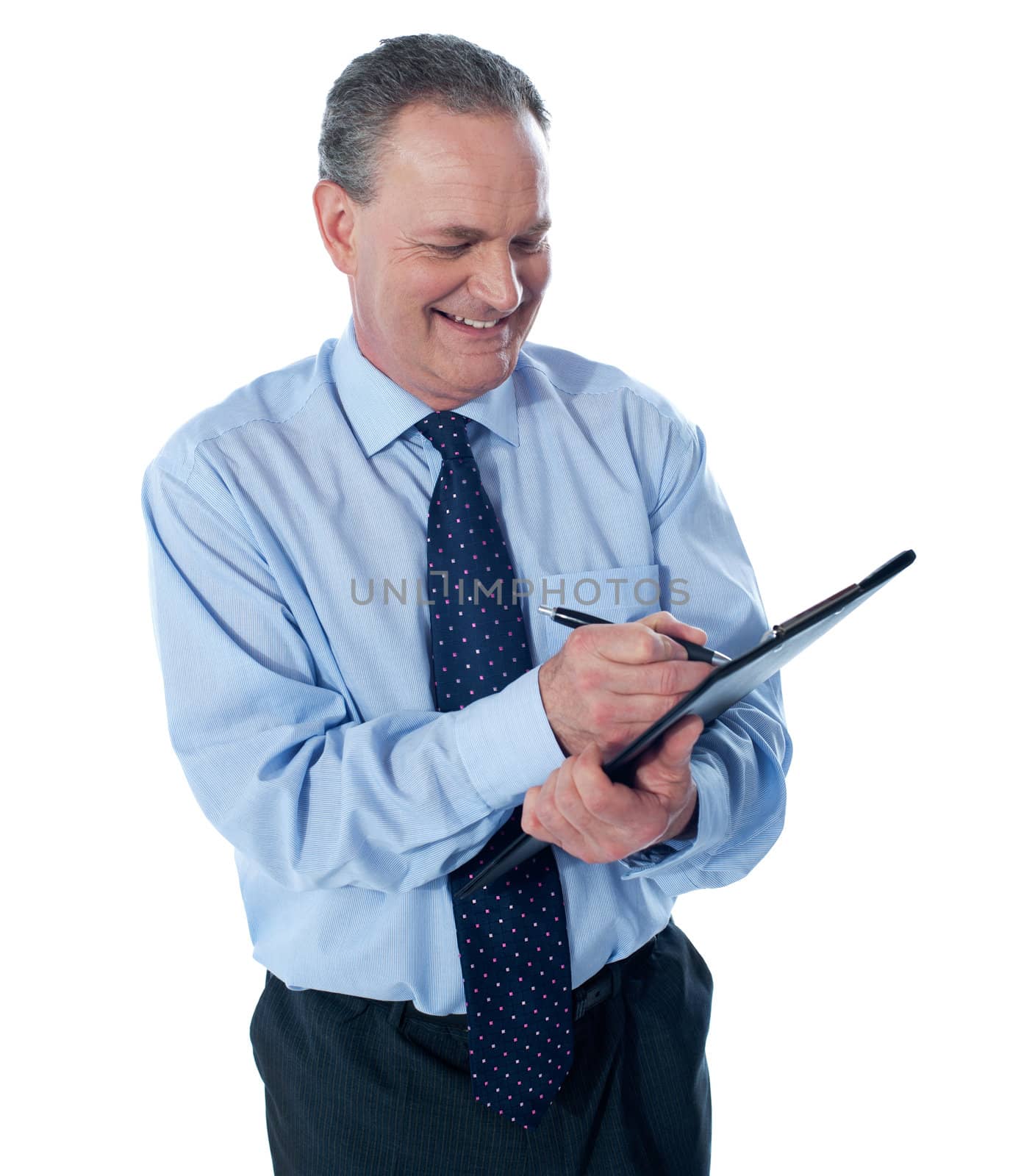 Smiling businessman writing on clipboard. All on white background