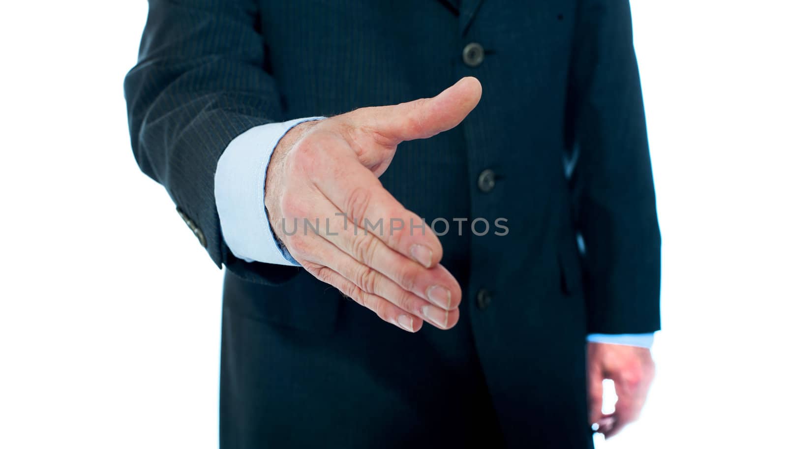 Modern businessman offering handshake by stockyimages