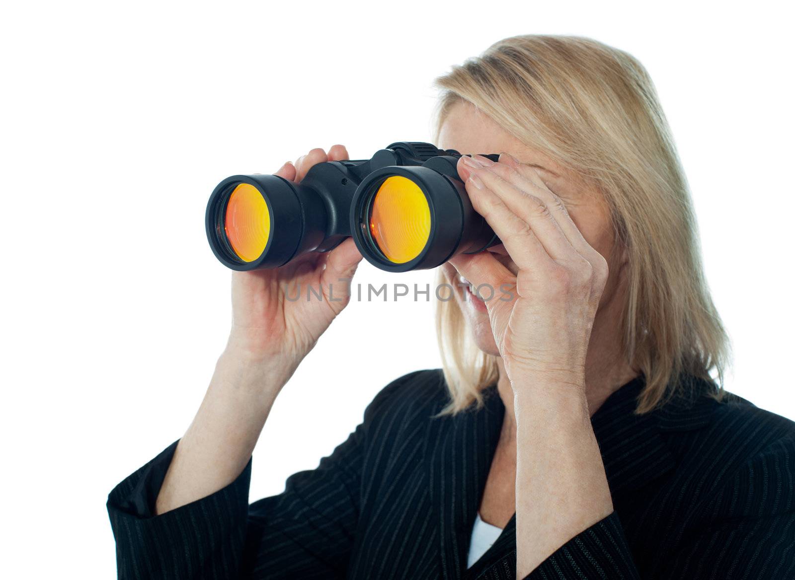 Female executive monitoring through binocular against white background