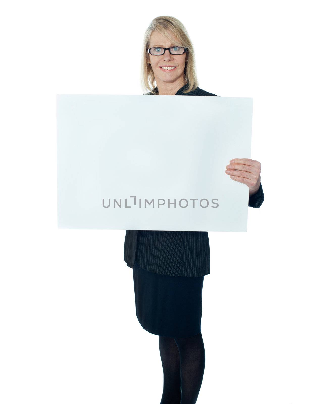 Corporate lady promoting blank placard by stockyimages