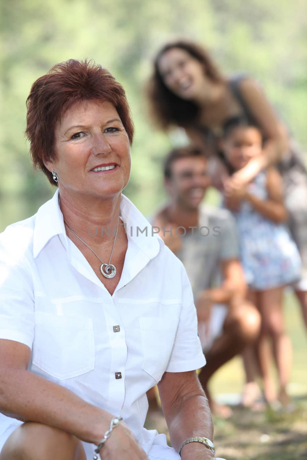 A grandmother enjoying a Sunday afternoon with her family.