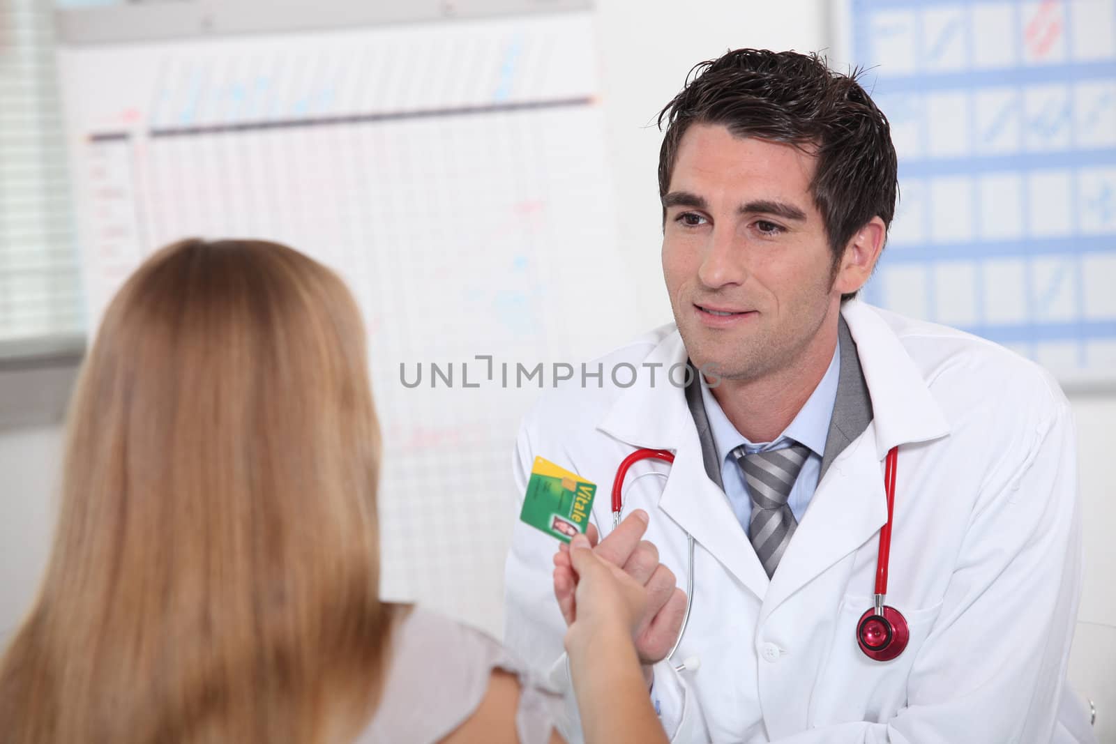 Physician meeting patient by phovoir