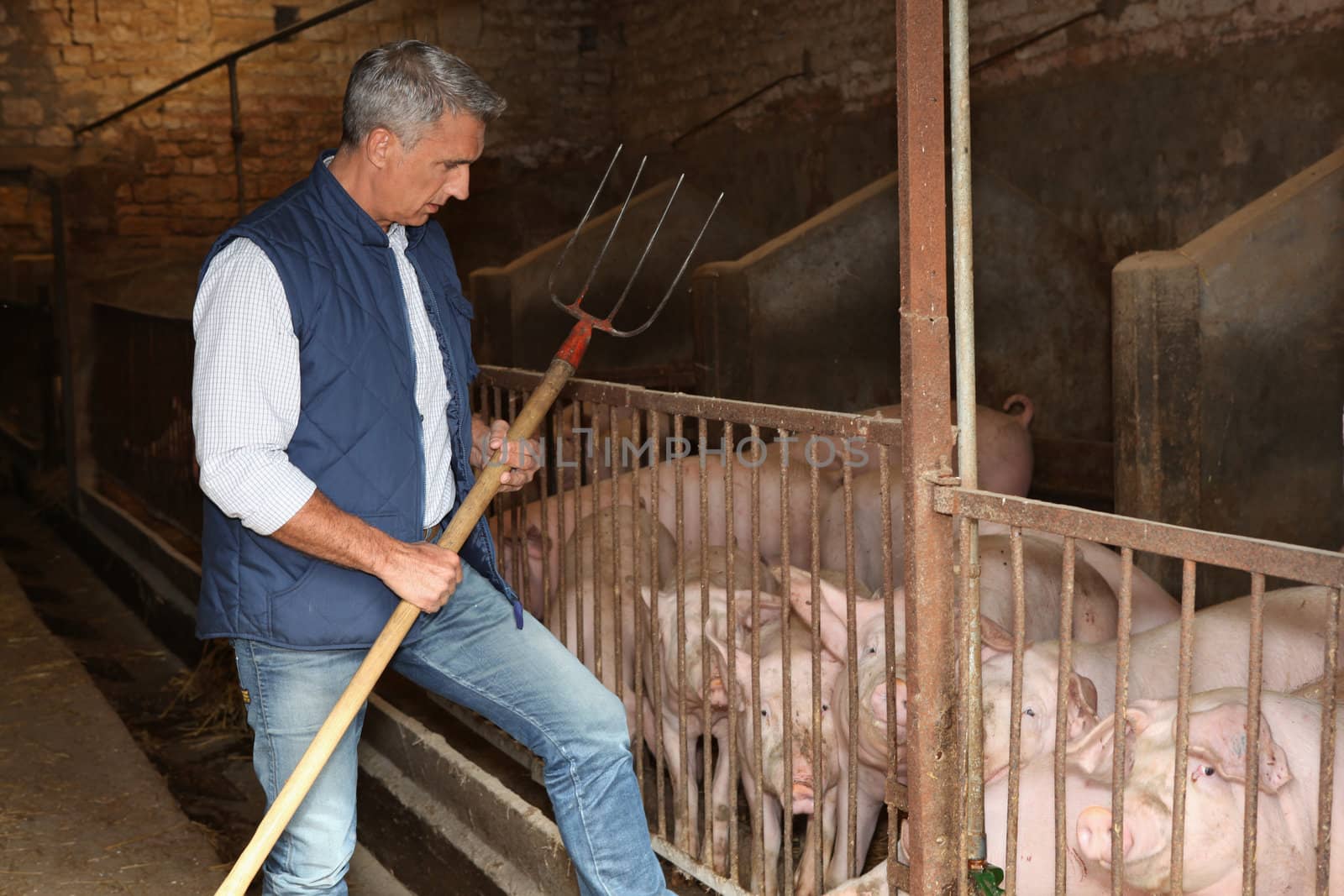 Farmer with pitchfork