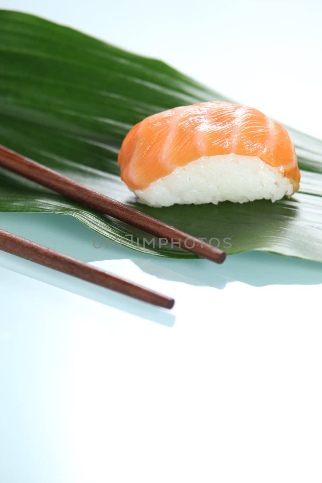 Sushi and chopsticks by phovoir