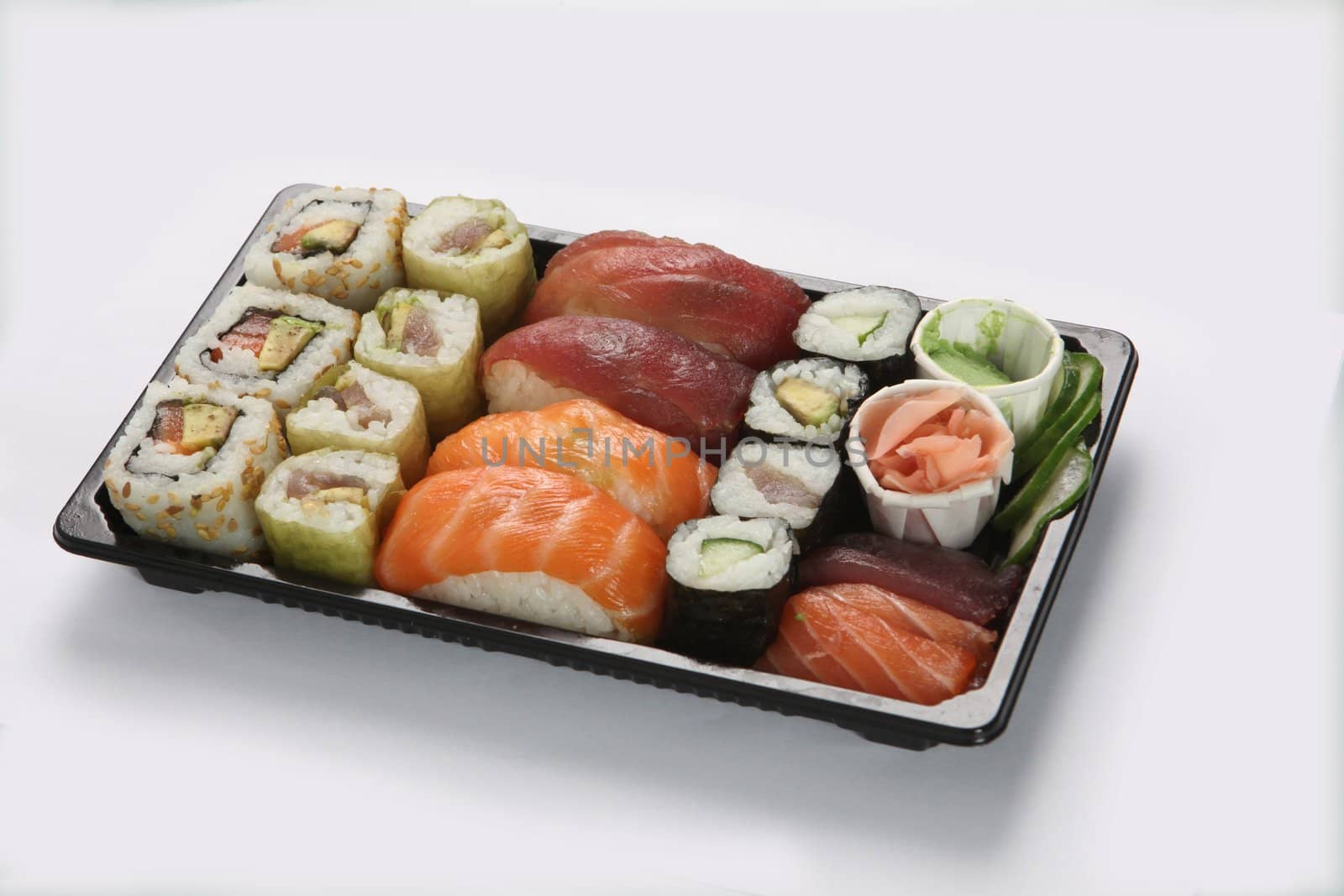 Tray of sushi by phovoir