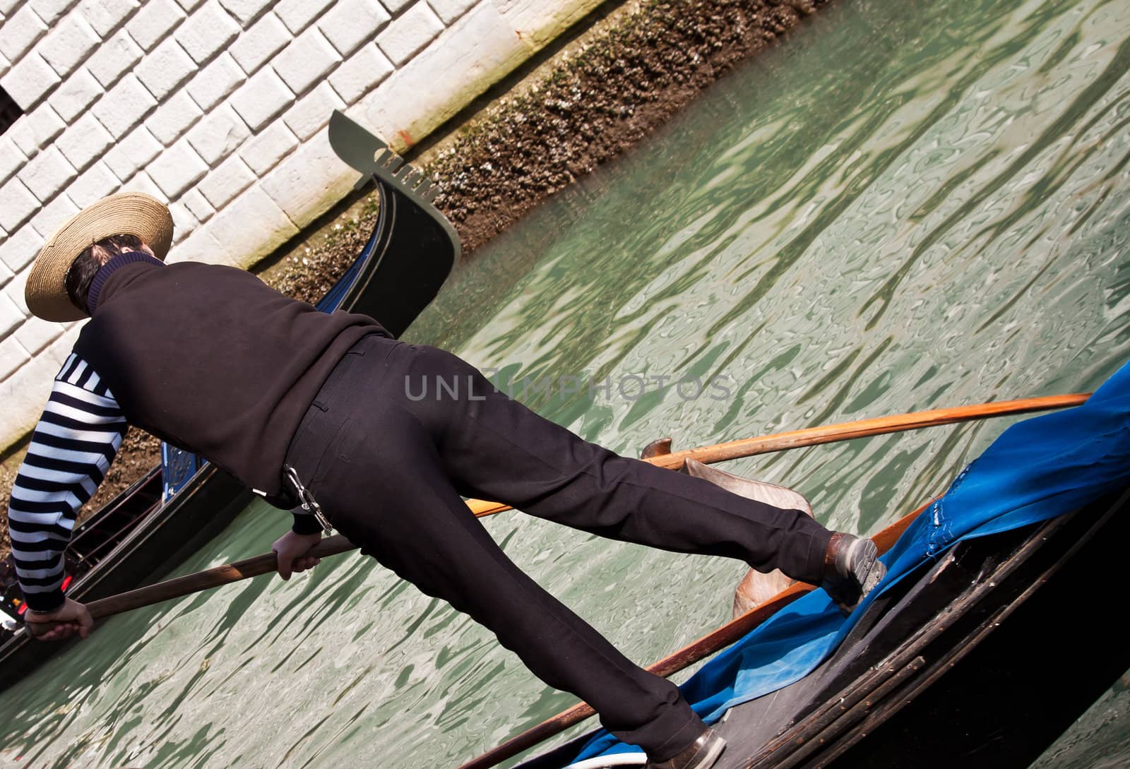 Gondolier in Venice by sewer12