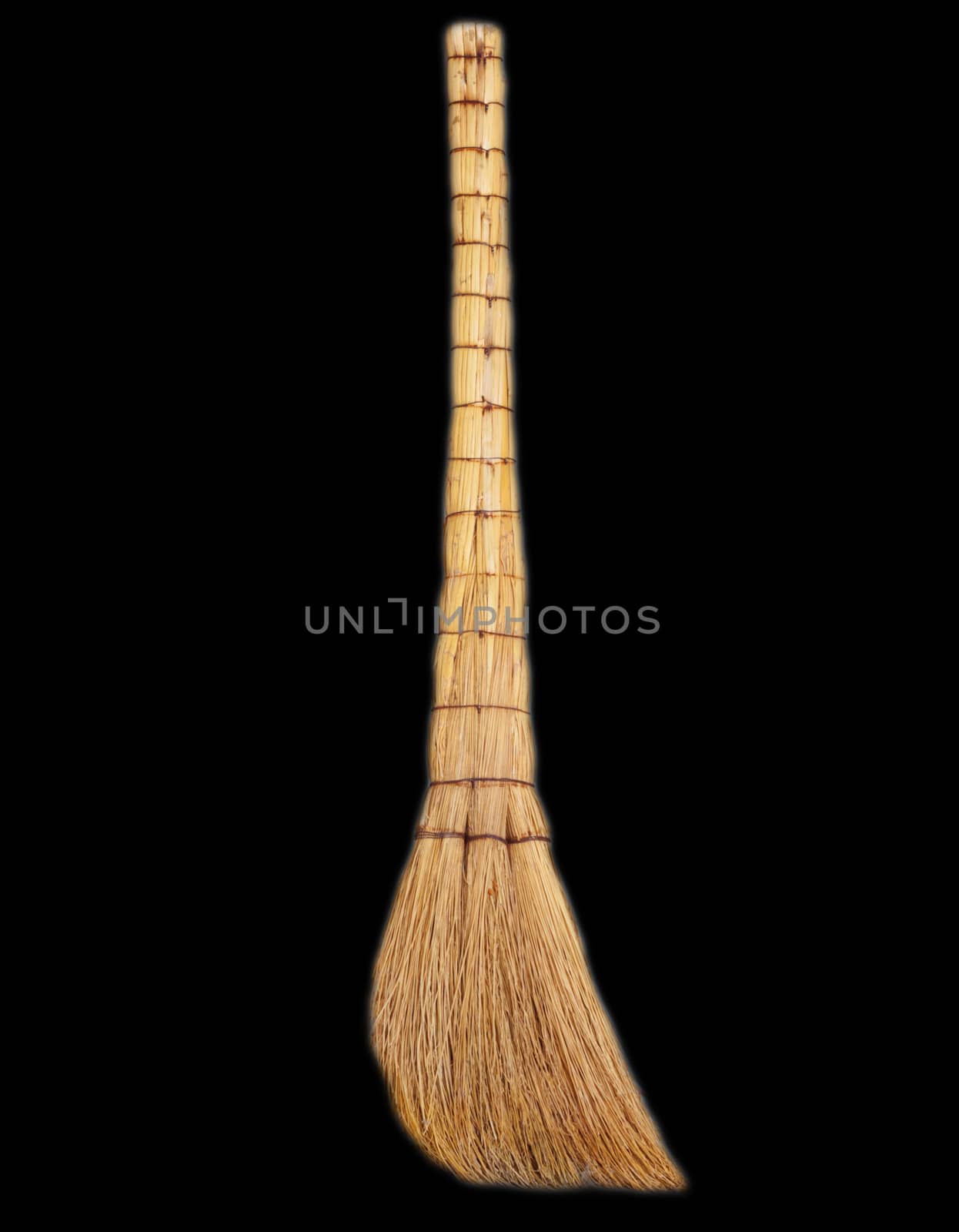 broom on a black background