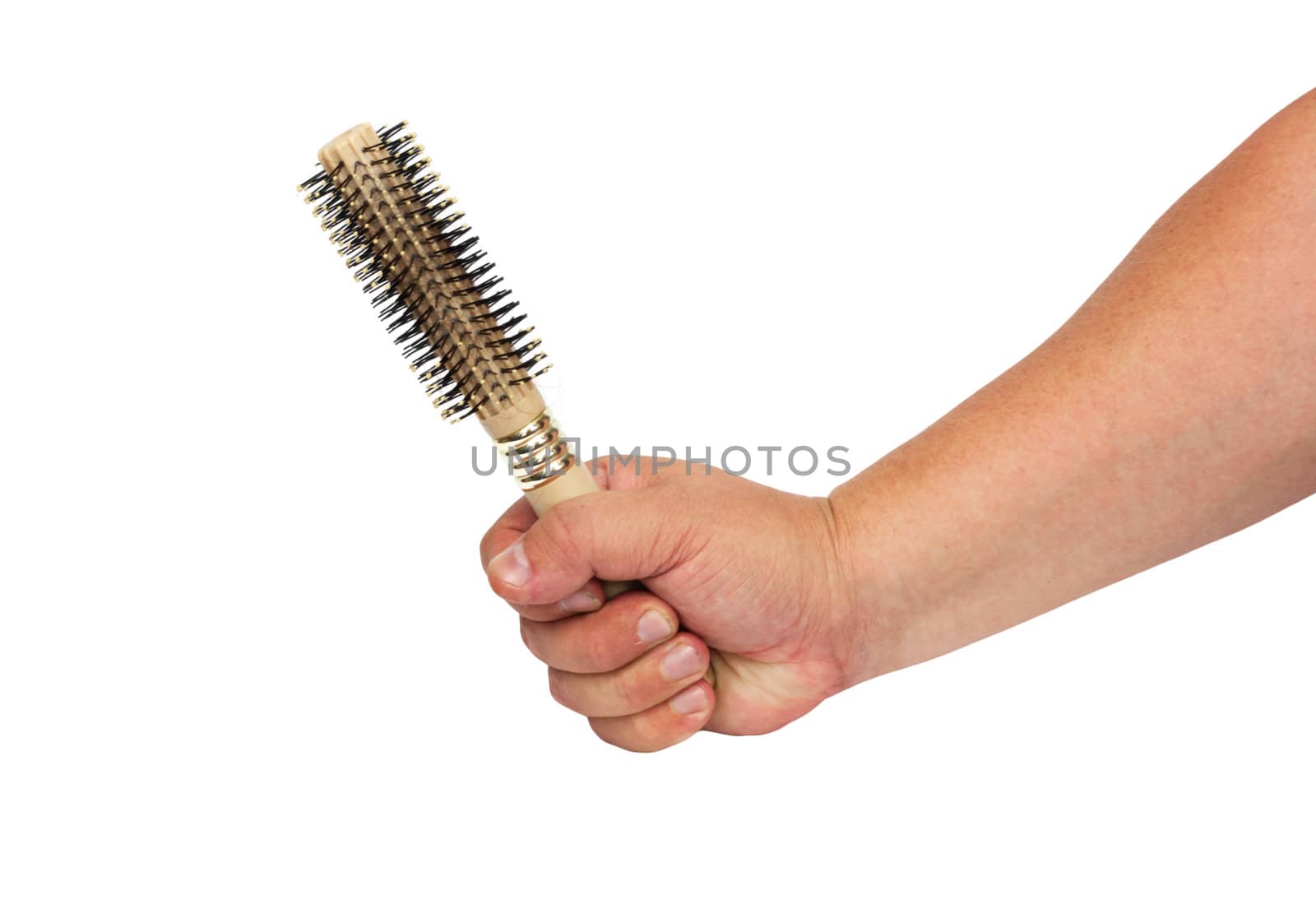 Thermal hairbrush in the hand isolated on white background 