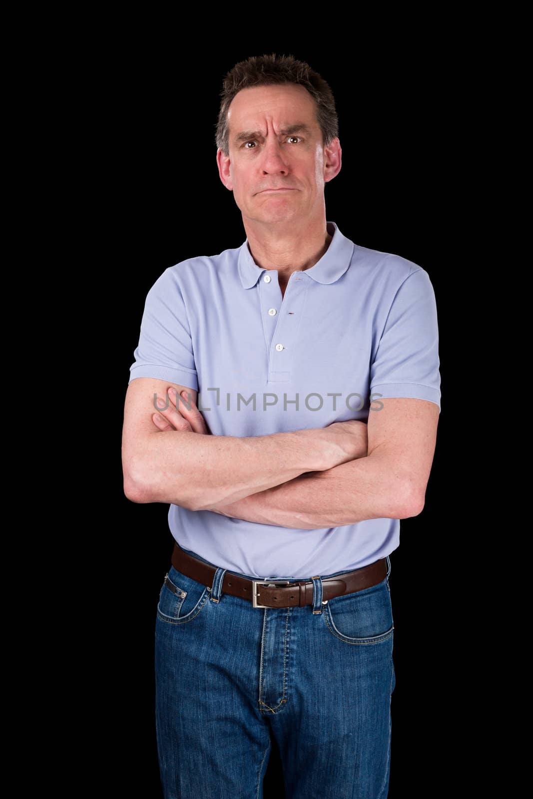 Angry Frowning Grumpy Middle Age Man with Arms Folded Black Background