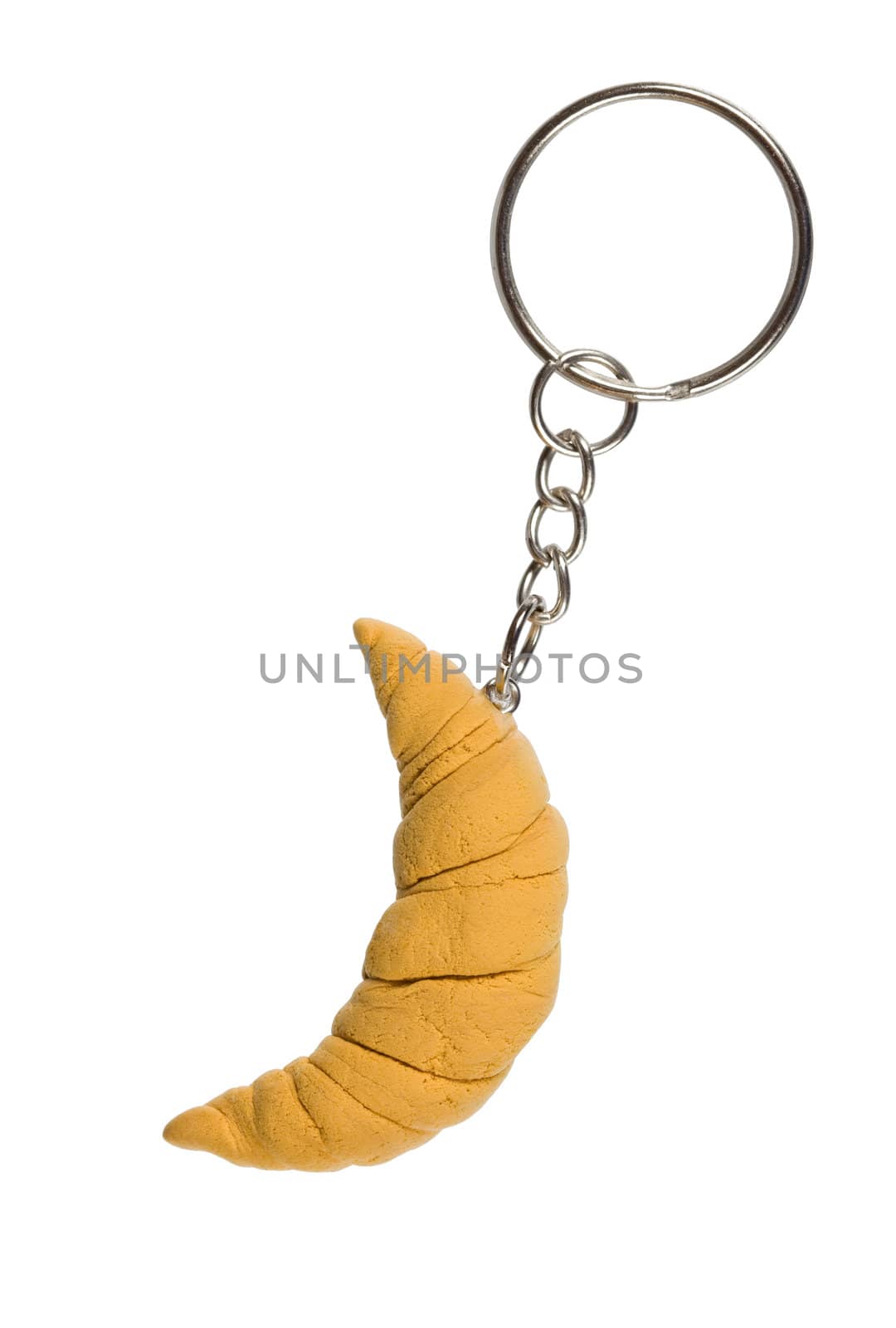 Charm as a croissant isolated on white background. Handmade.