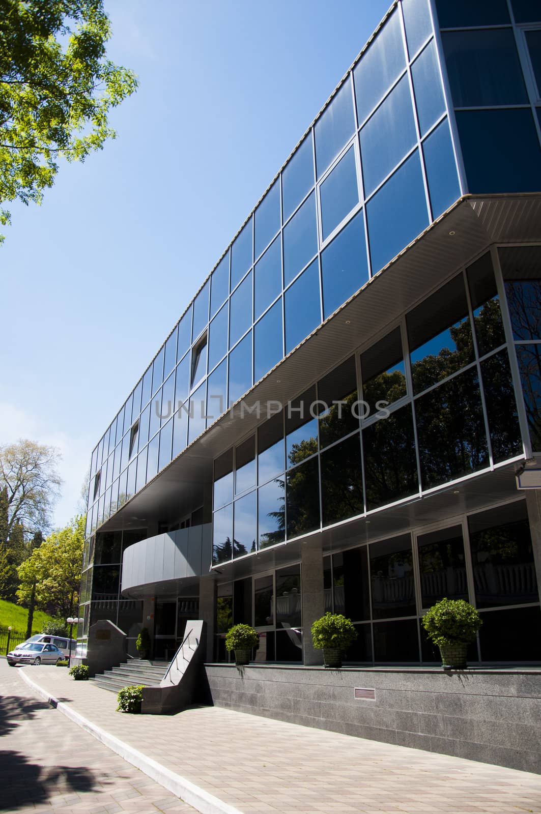 Input in modern office building and sidewalk