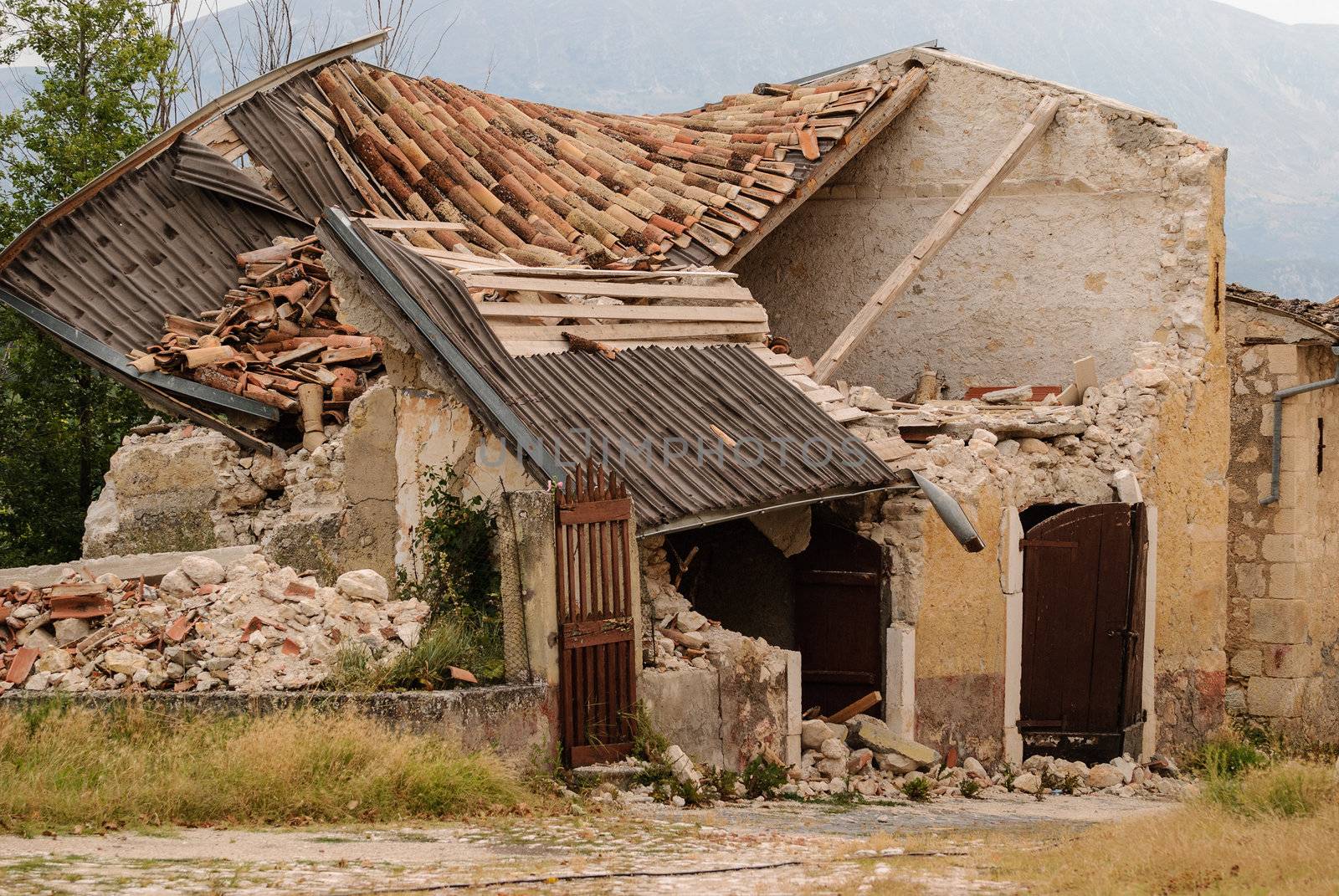 A collapsed house due to the 2009 earthquake in a town near L'Aquila.