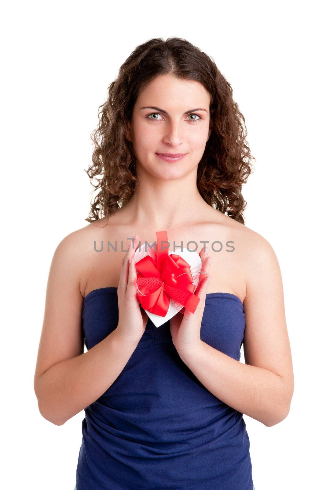 Woman holds a heart shaped box with her hands, isolated in white