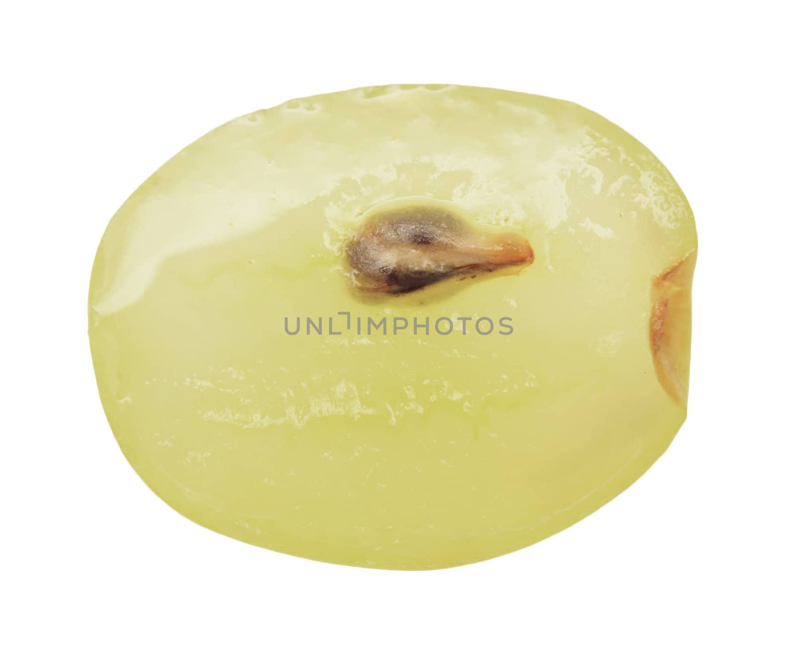 Translucent slice of green grape fruit, macro isolated on white 