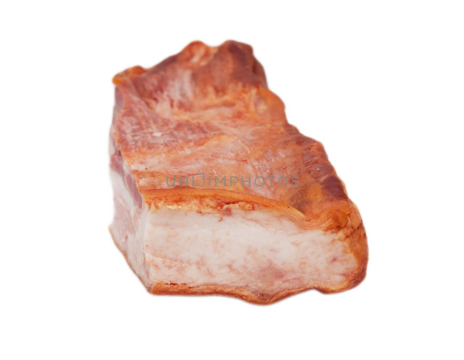 Smoked bacon chunk isolated over white background. 