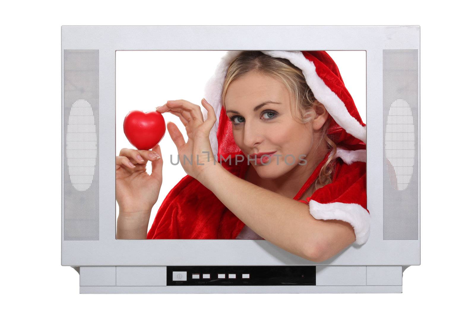 woman wearing a Christmas costume behind a TV screen by phovoir