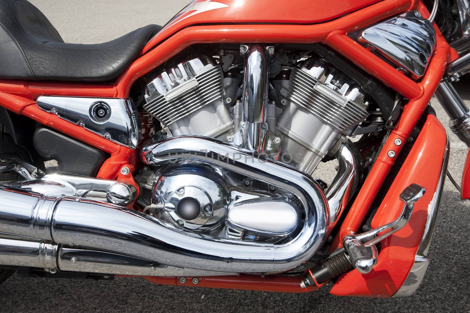 Motorcycle engine in chrome and orange
