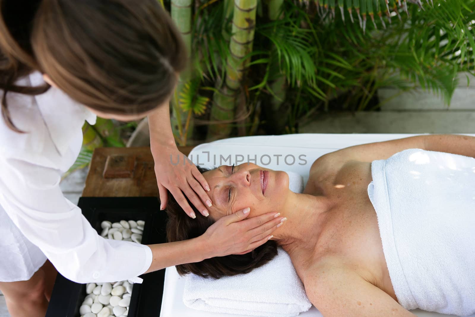Woman enjoying a massage by phovoir