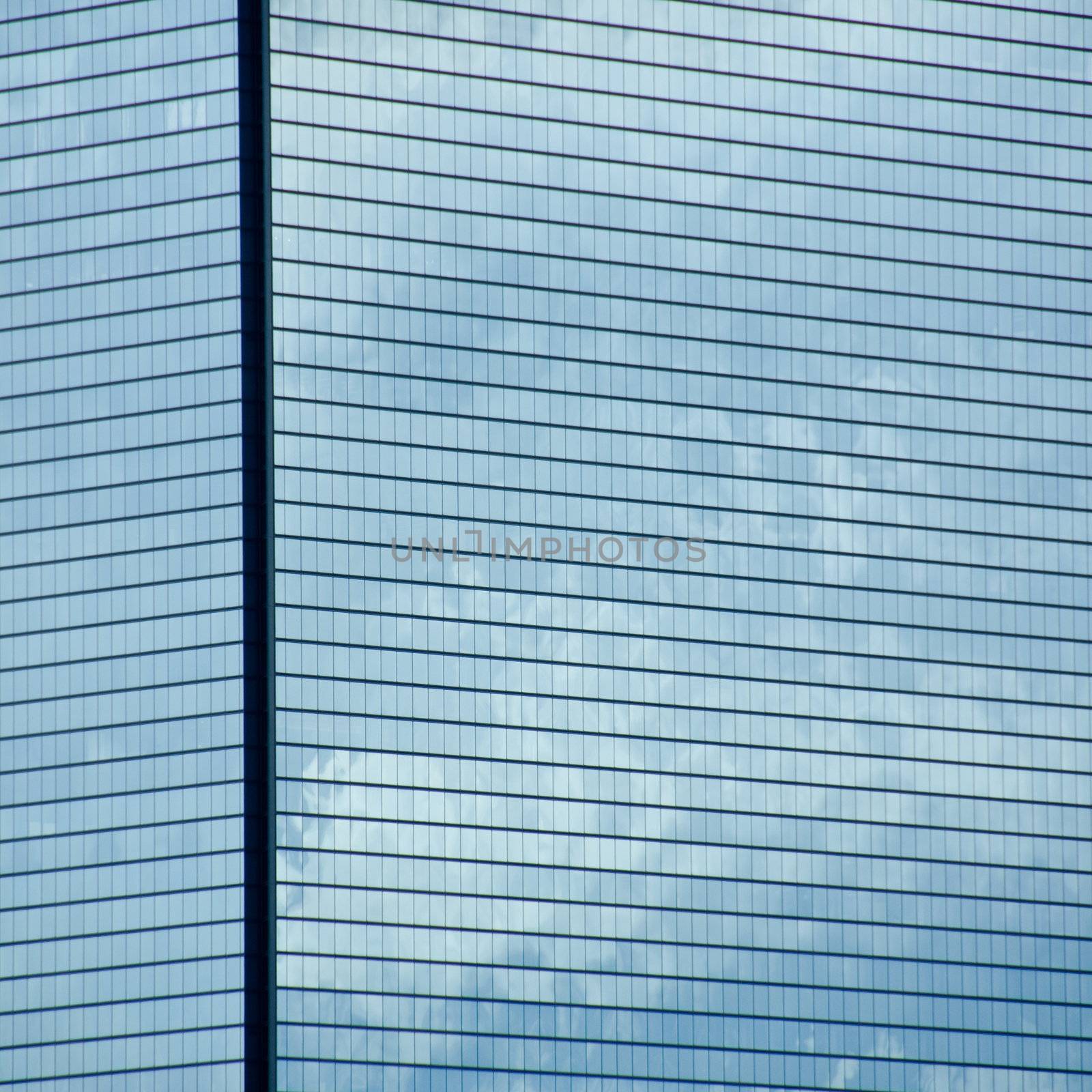 Closeup of a skyscraper glass facade background pattern