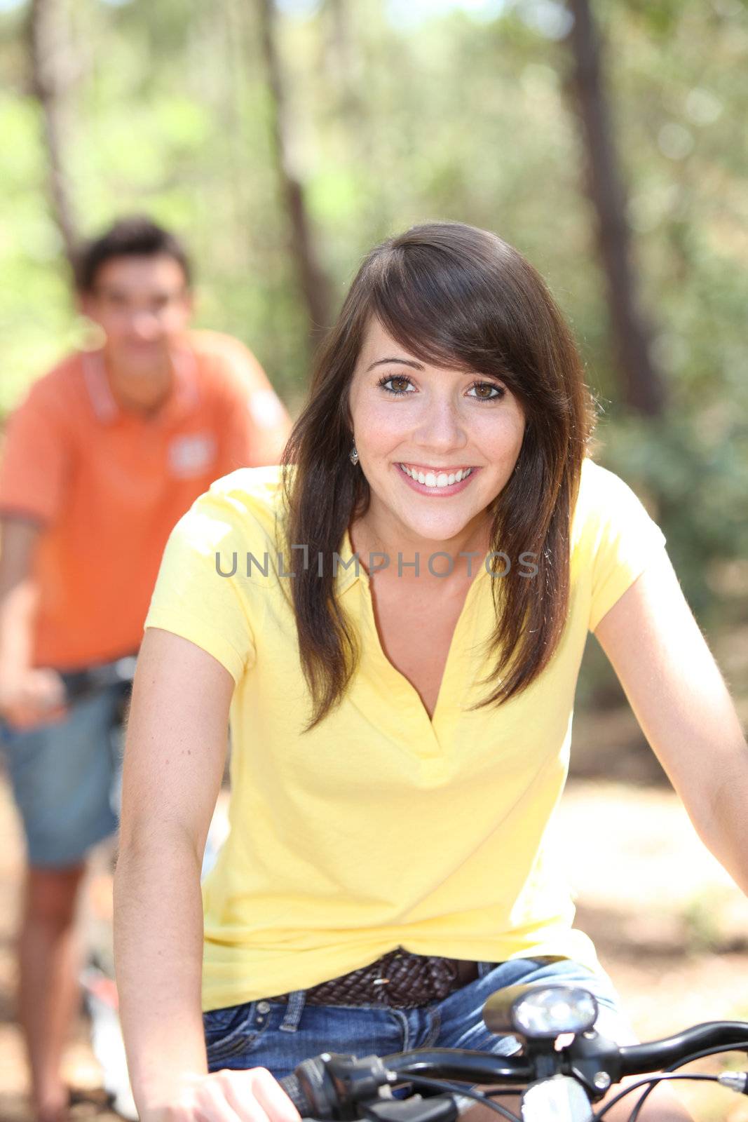 young people riding bikes