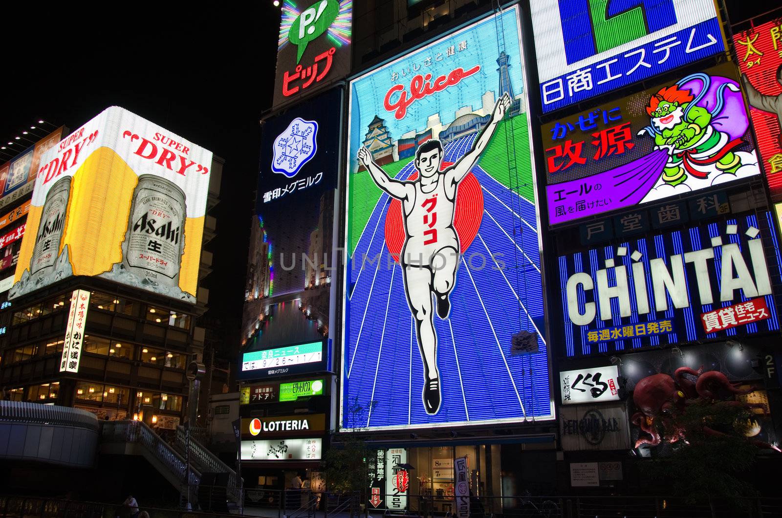OSAKA, JAPAN - September 21: The famous Glico Man billboard in Dotombori, a popular entertainment district in Osaka on September 21, 2012 in Osaka, Japan