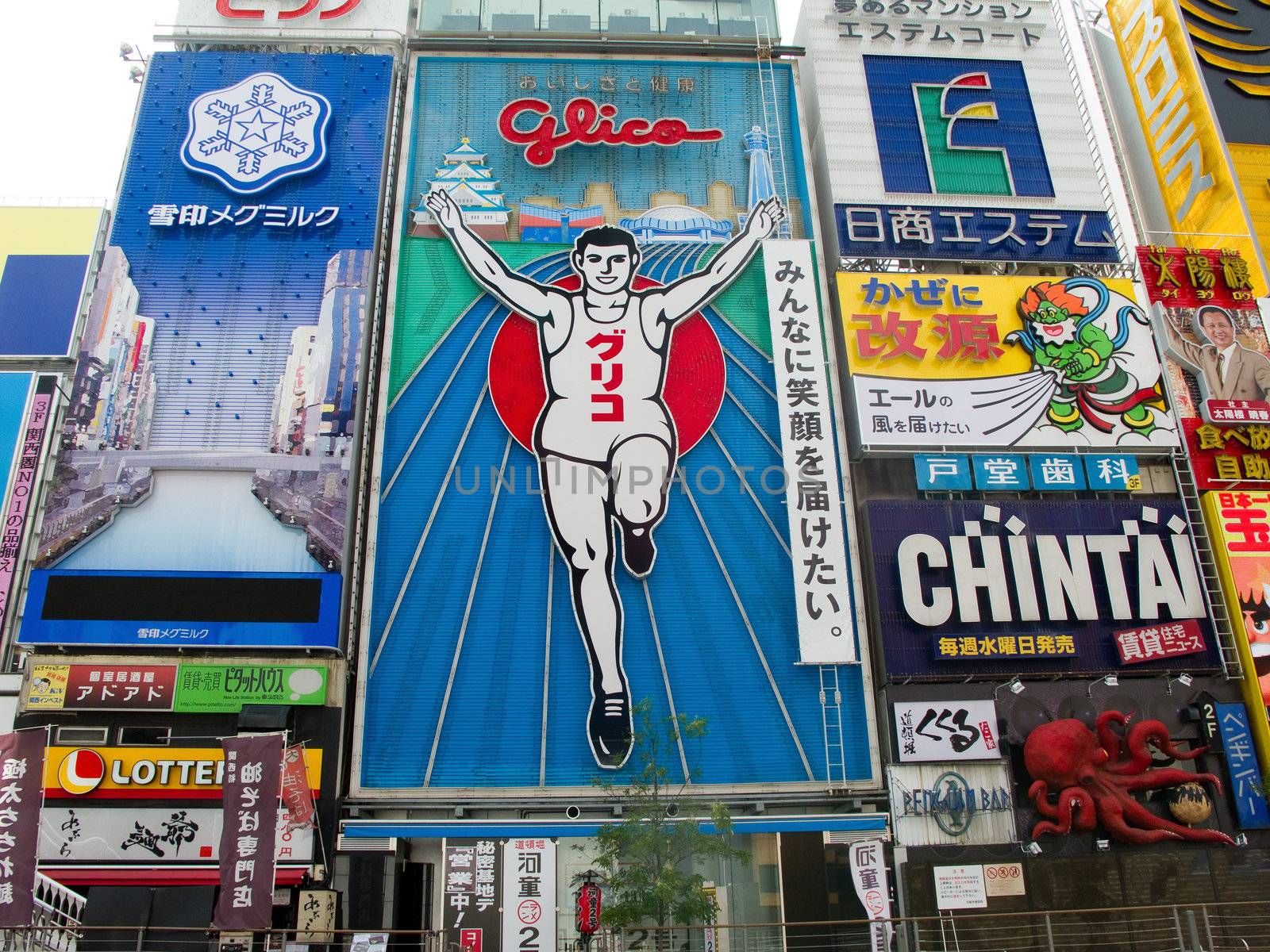 OSAKA, JAPAN - September 09: The famous Glico Man billboard in Dotombori, a popular entertainment district in Osaka on September 09, 2011 in Osaka, Japan