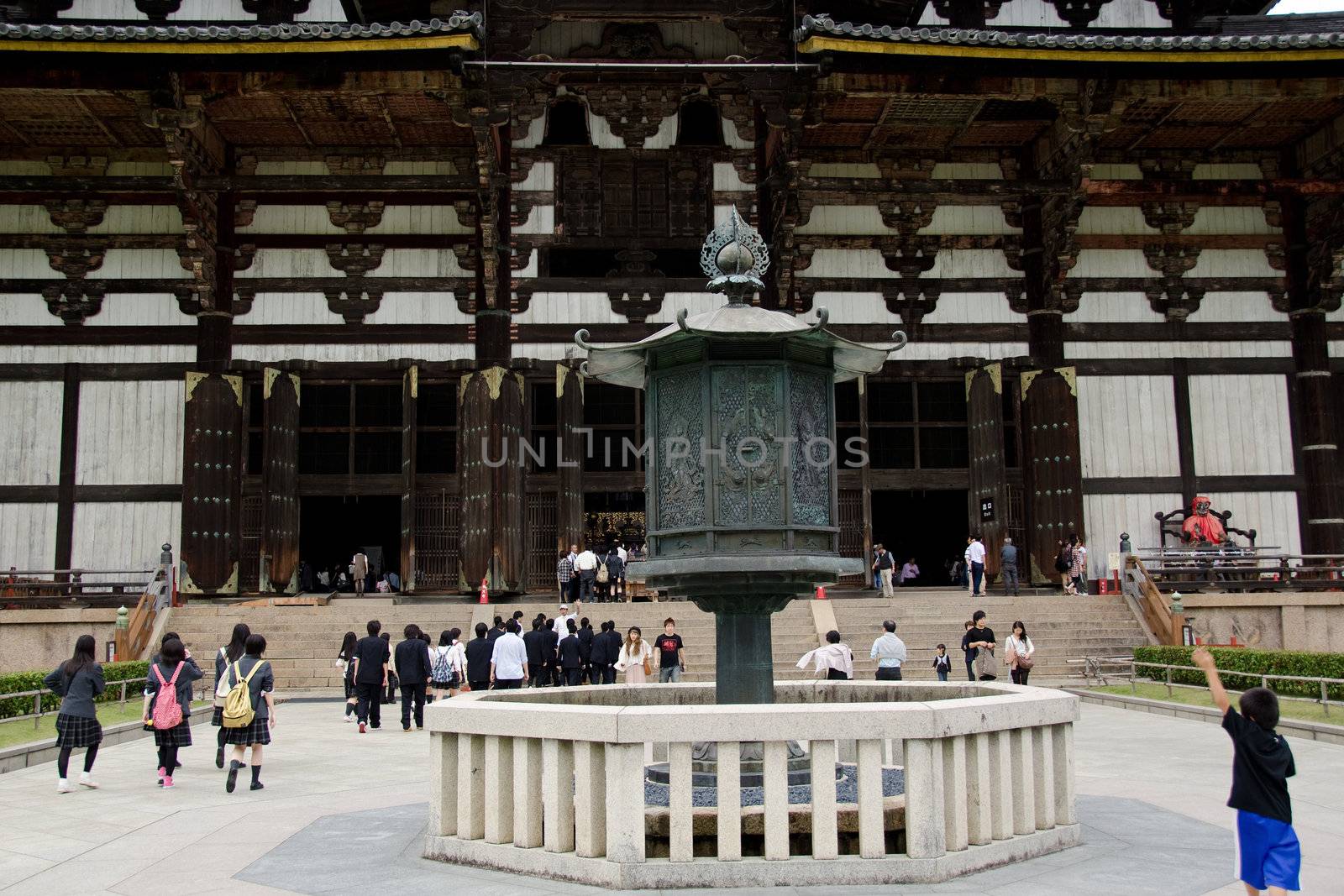 Entrance doors and lantern in front of the Great Buddha Hall, daibutsuden, of the Todai-ji buddhist temple in Nara, Japan
