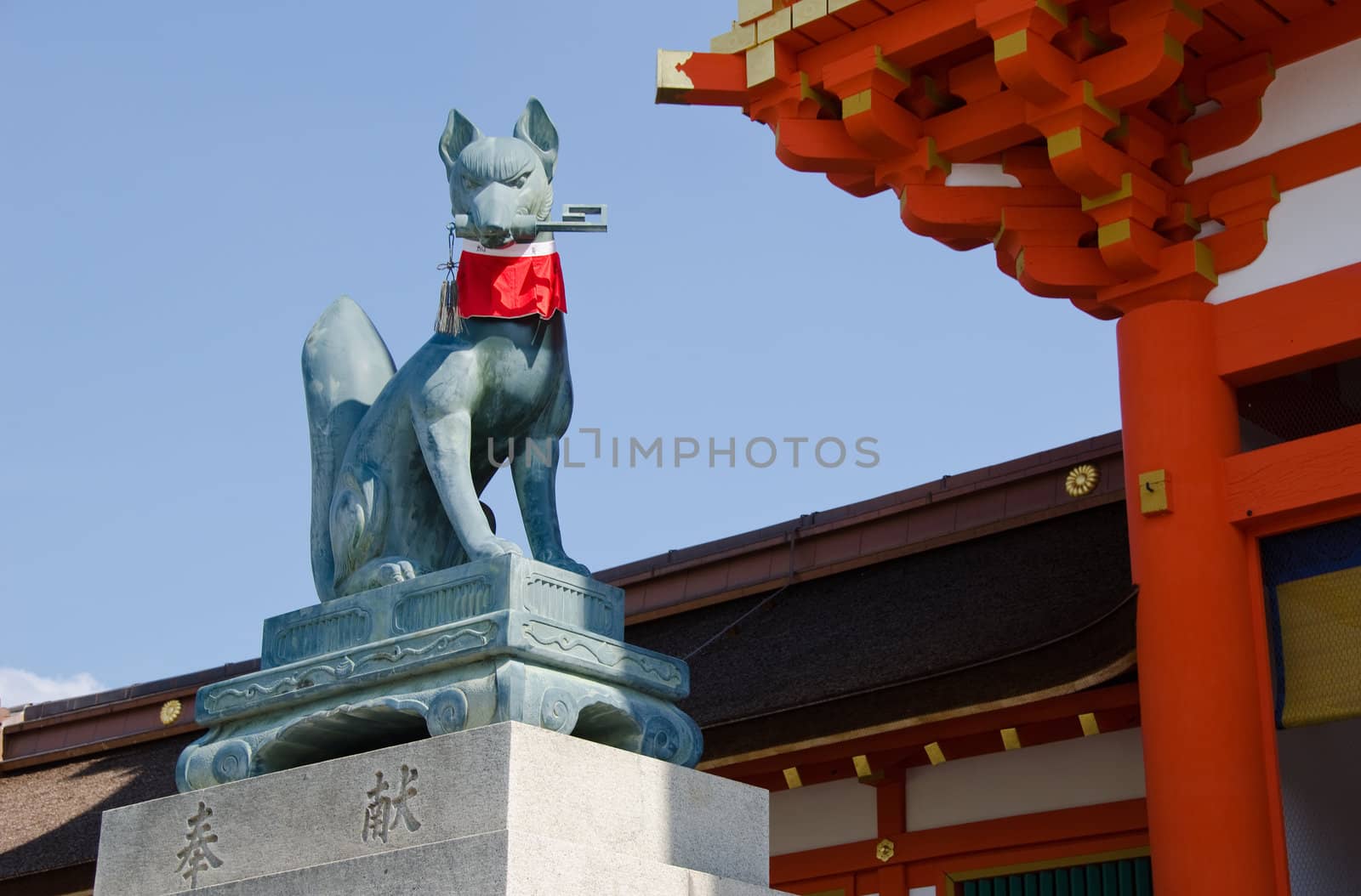 Fox statue at the Fushimi Inari taisha Shrine in Kyoto Japan