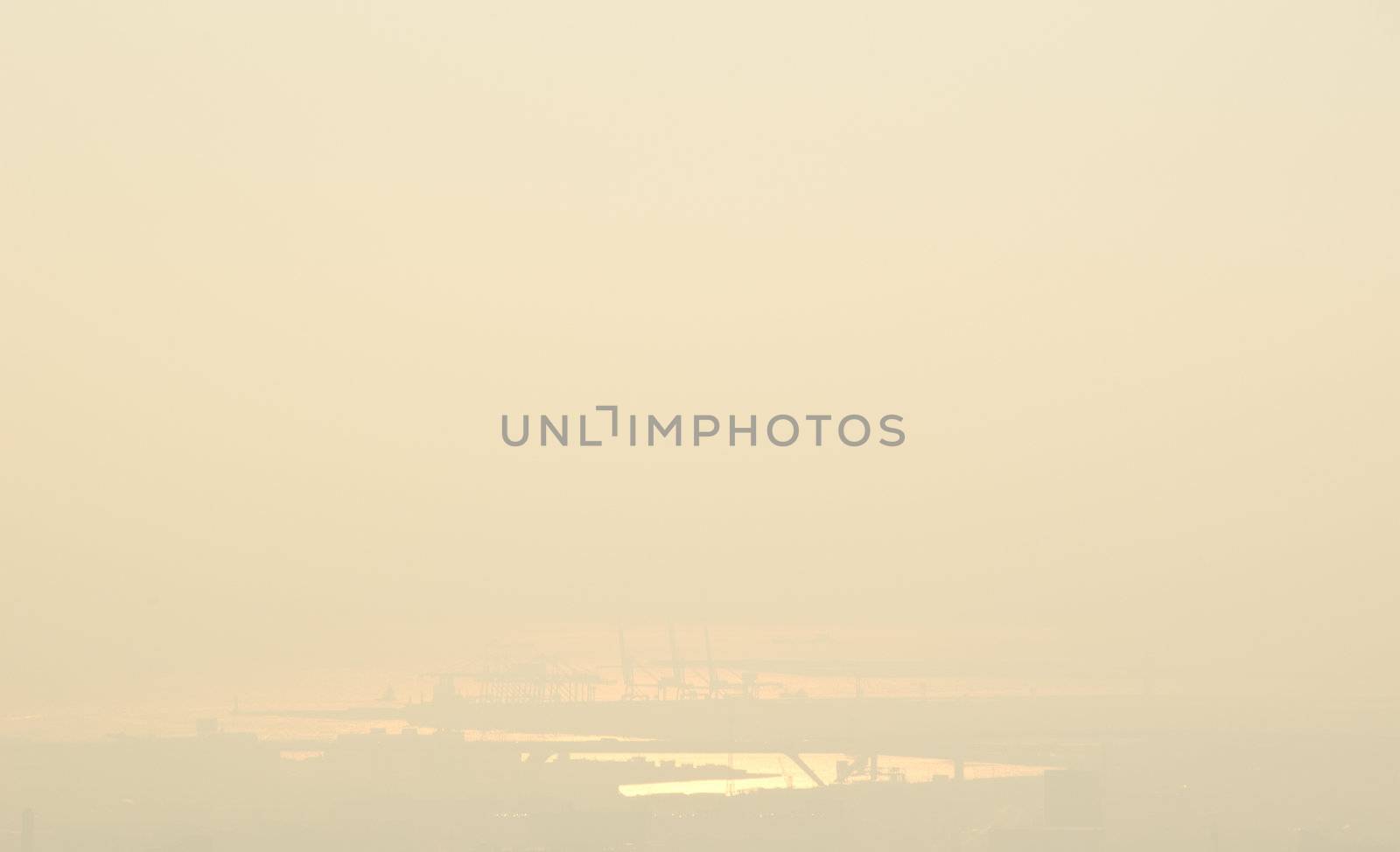 The harbor of Osaka on a foggy and sunny day