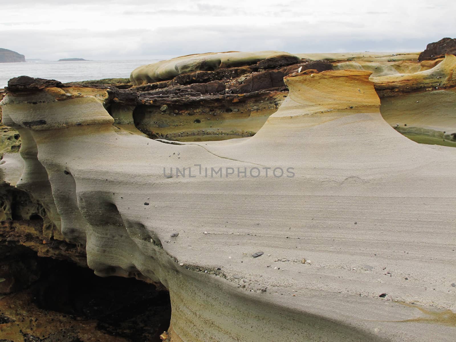 sandstone structure at coast by Arrxxx