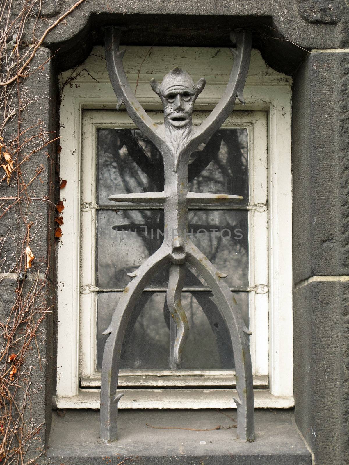the devil as a window grate by Arrxxx