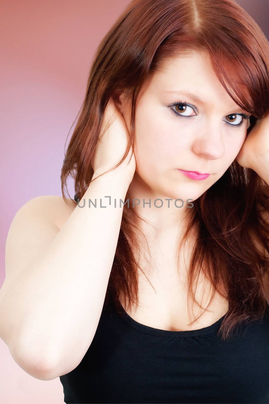 Beautiful woman with brown long hairs. All on colored background.