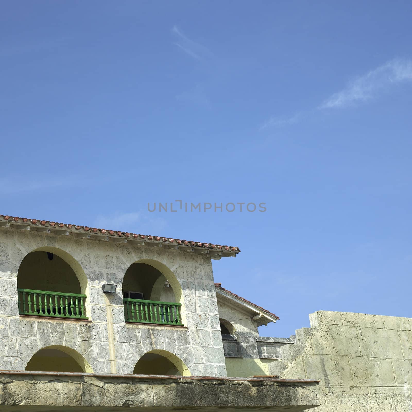 Old tropical villa made of stone blocks