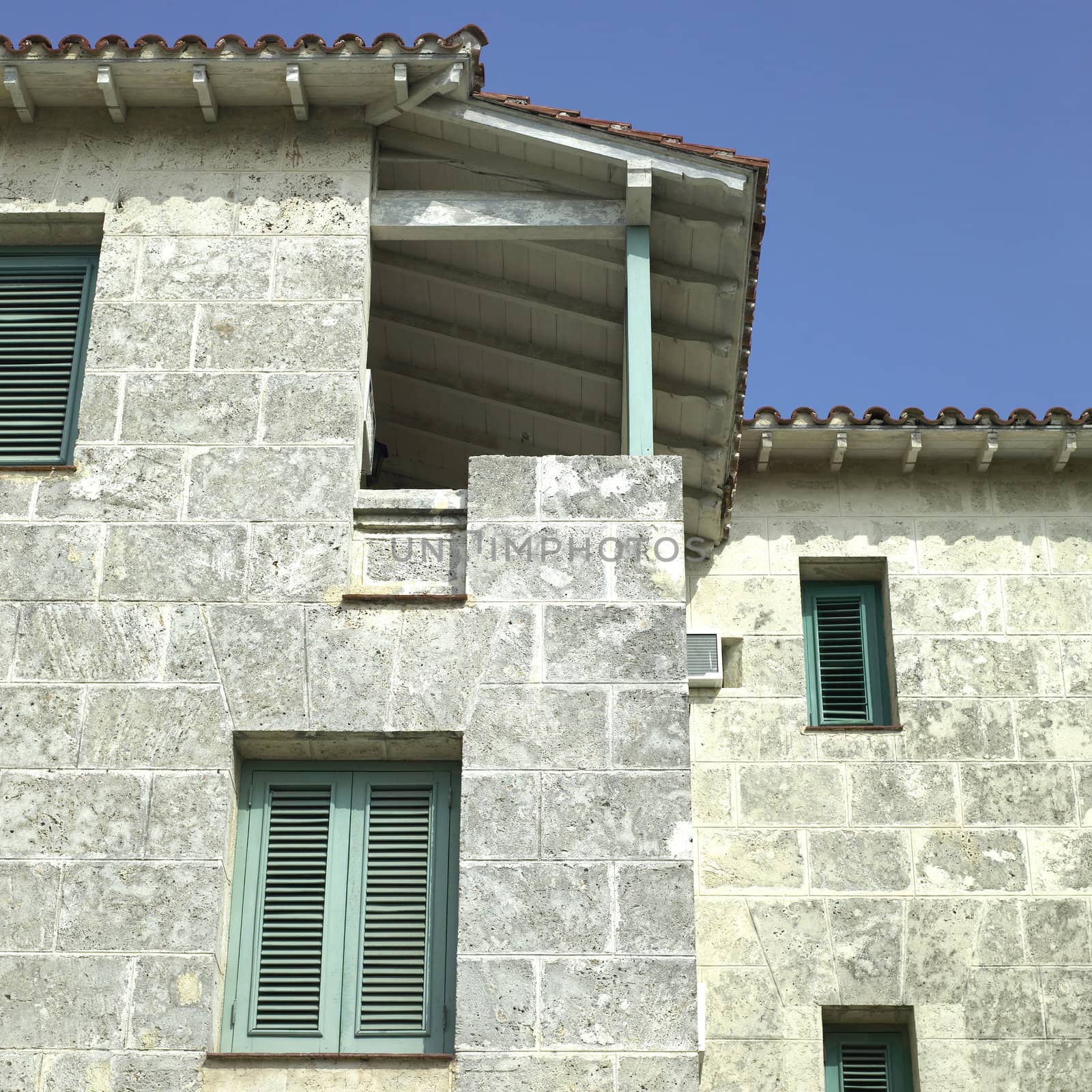 Old tropical villa made of stone blocks