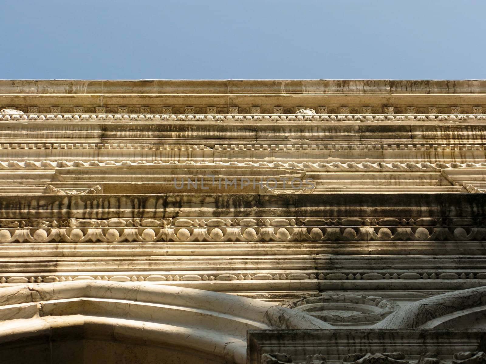 Different cornice patterns on a building in venice, italy