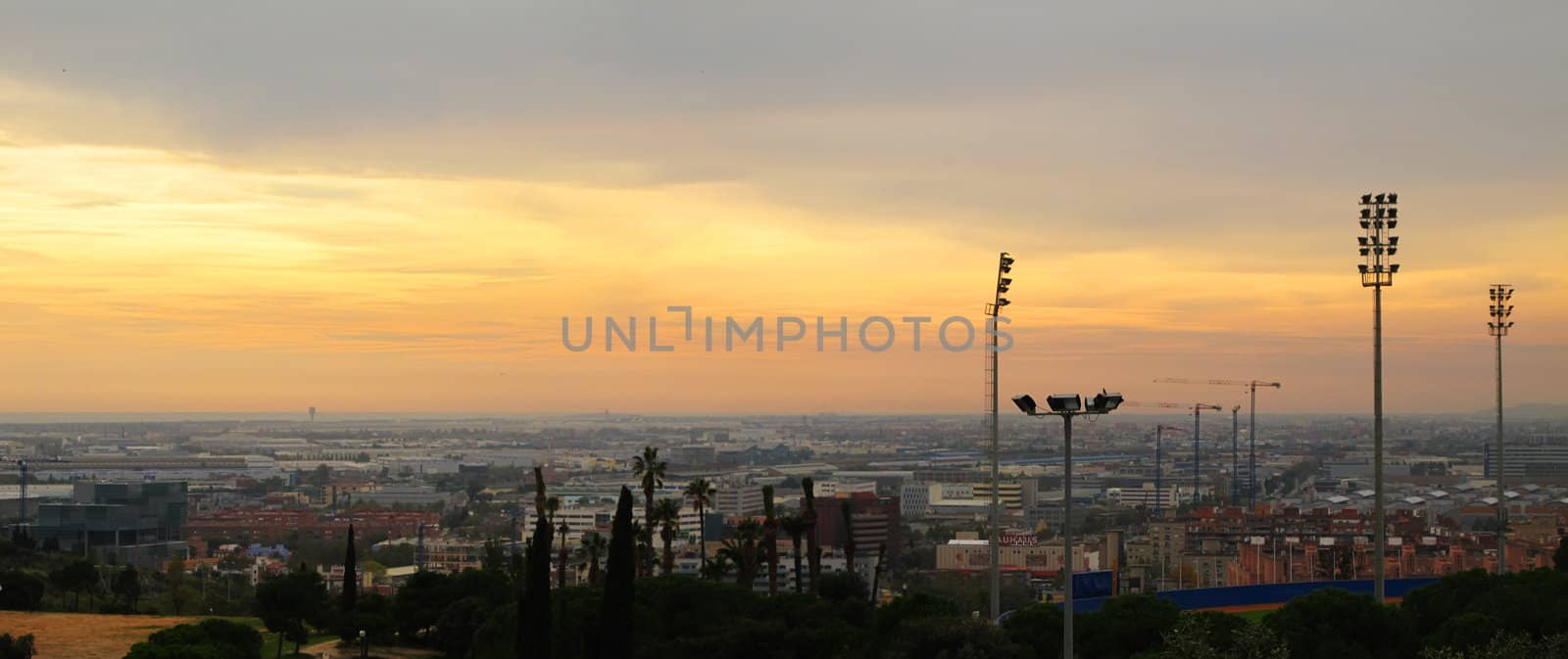 Barcelona, montjuic, stadium, sunset and airport in the background