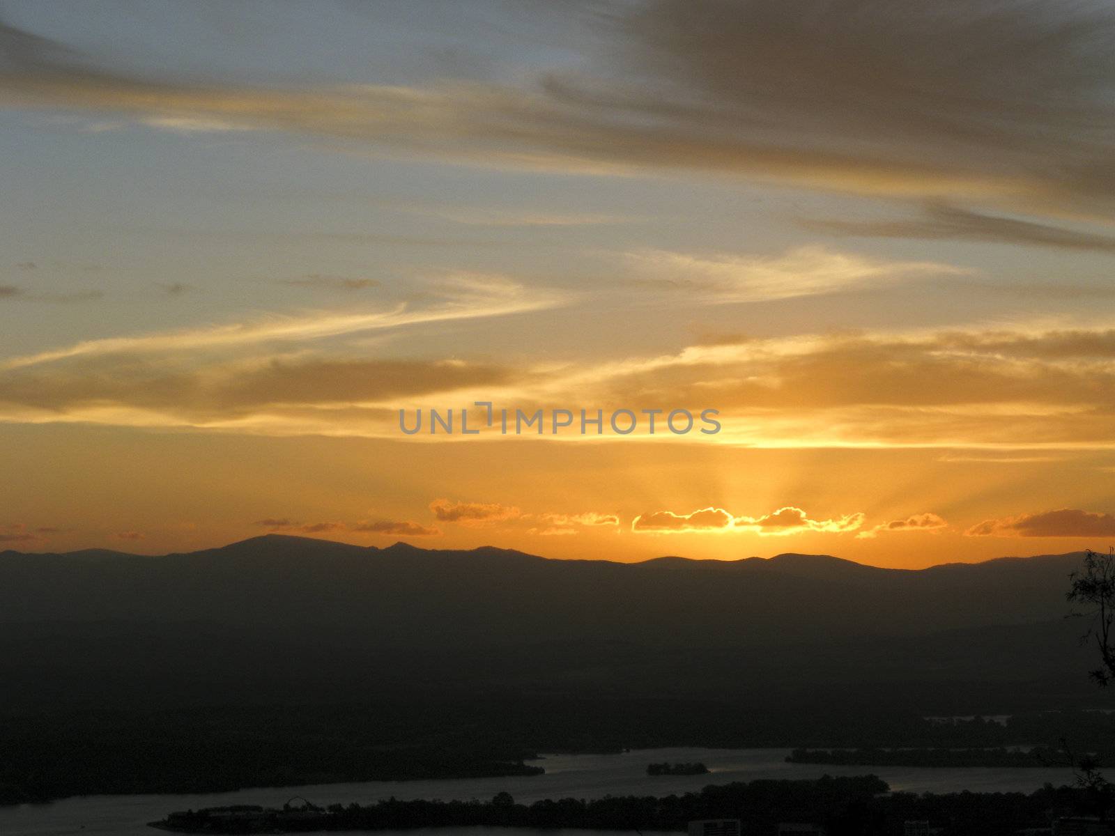 sunset with mountains and river in canberra, australia