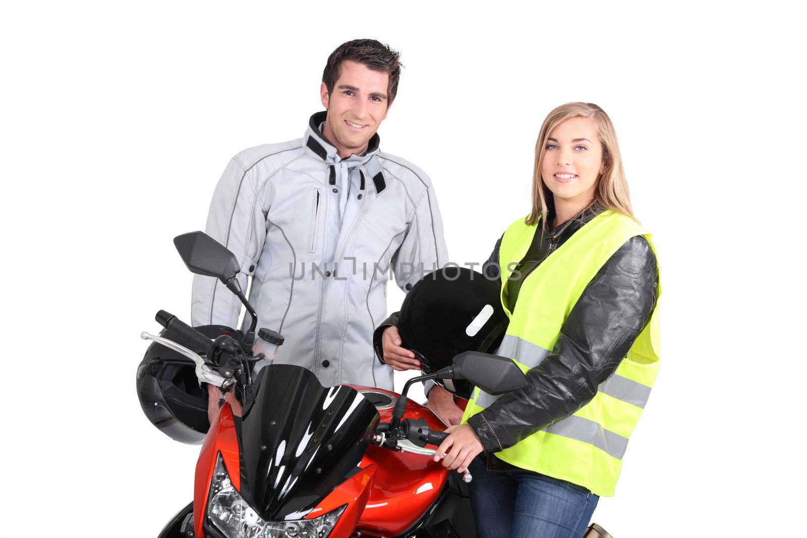 portrait of young people with motorbike by phovoir