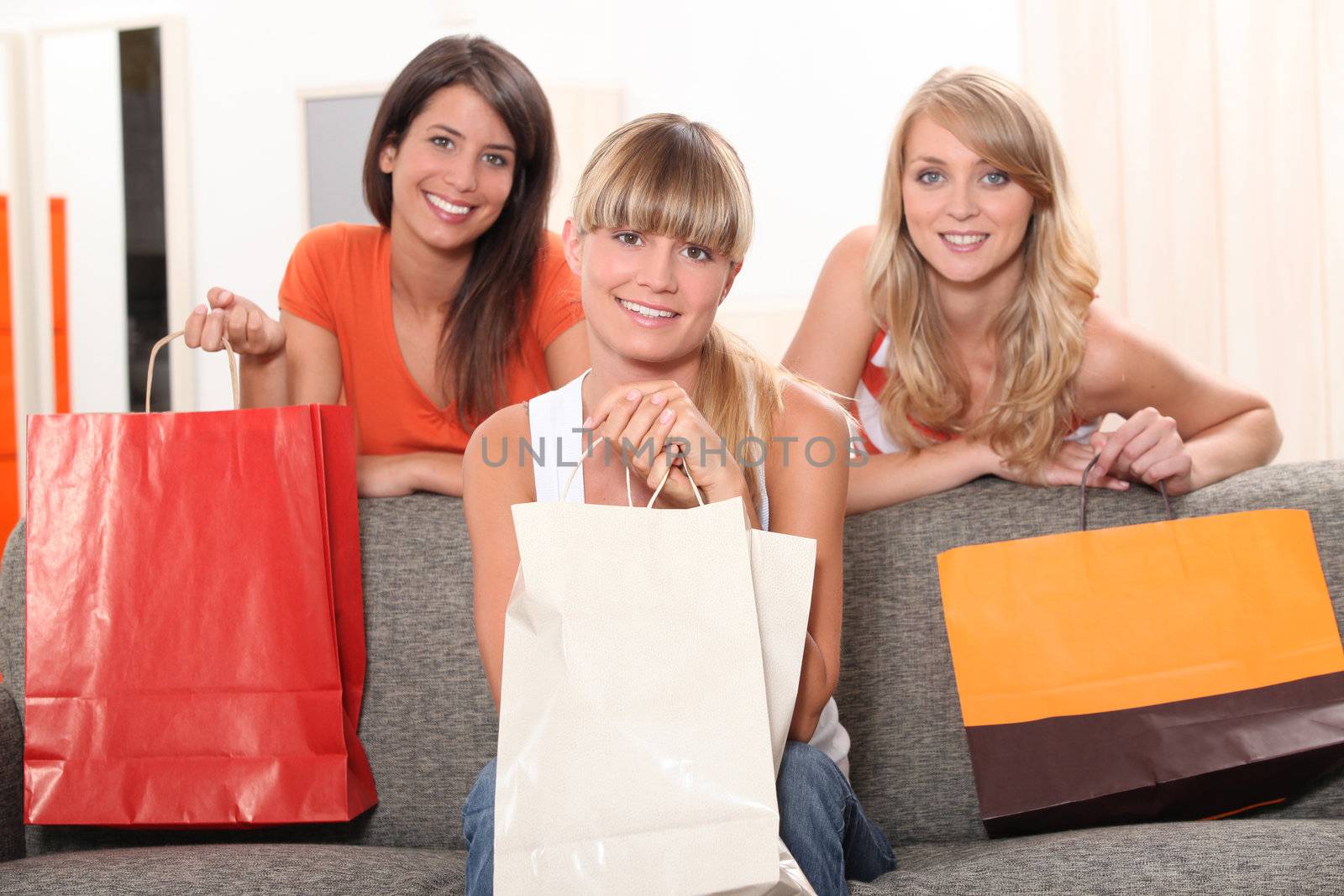 Friends with shopping bags by phovoir