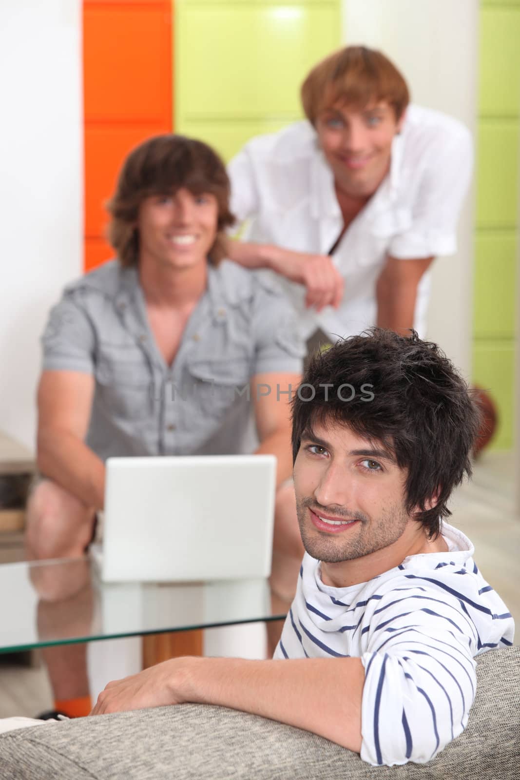 three young men in the lounge