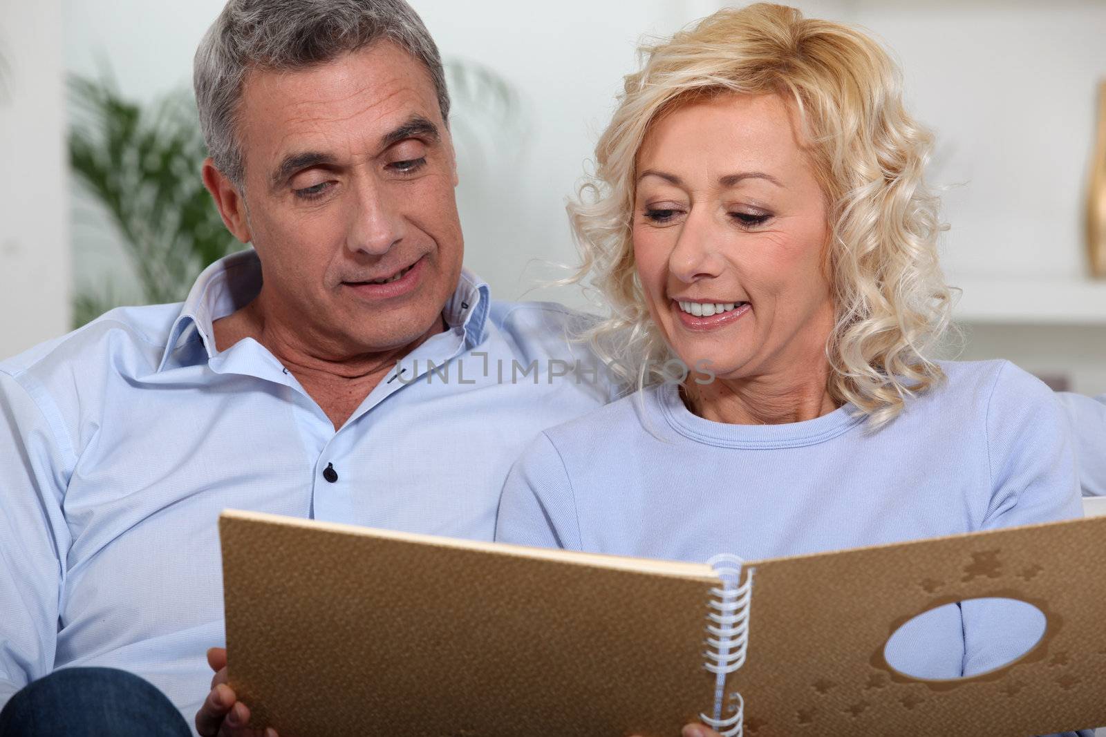 Couple looking at a photo album