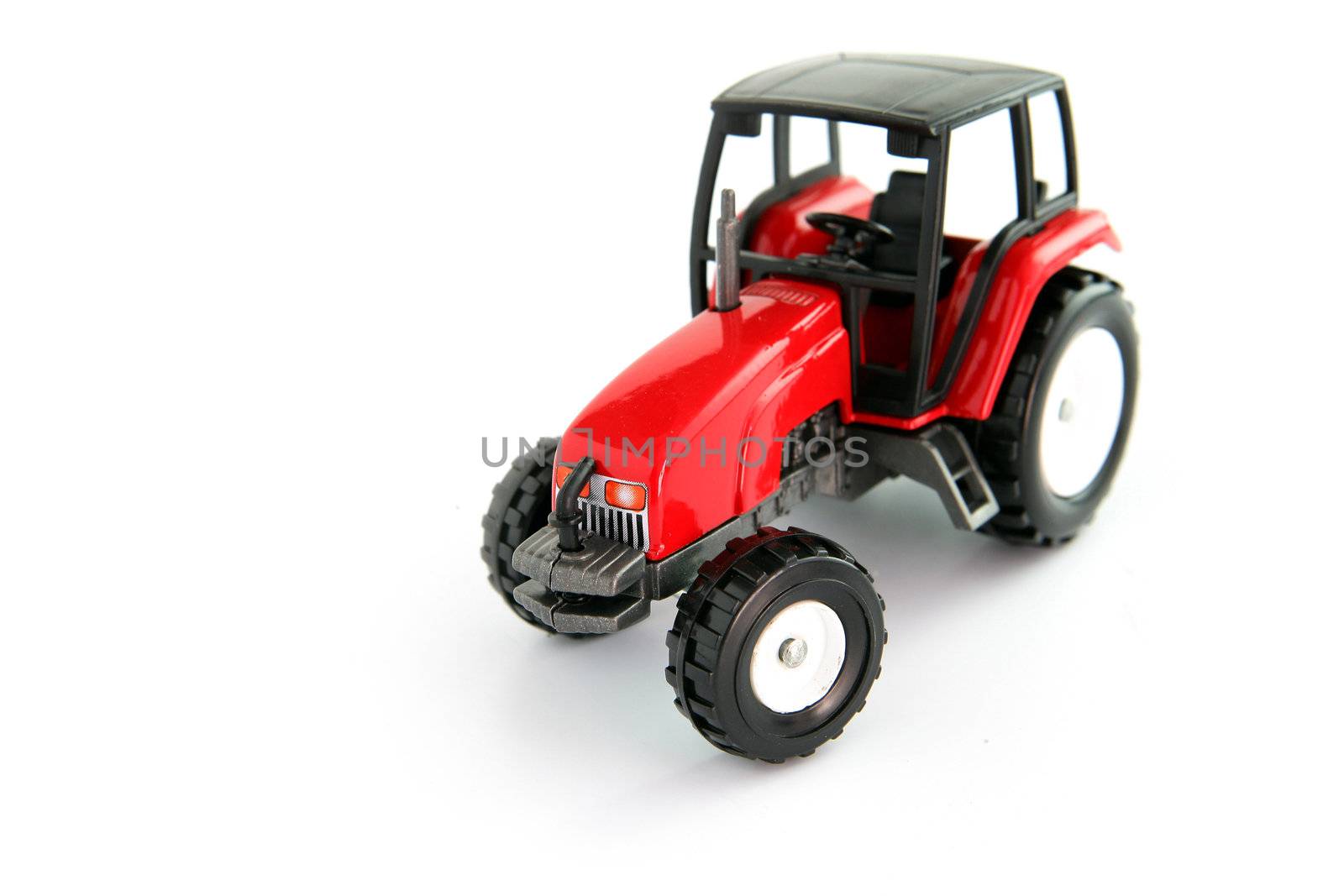 Red toy tractor by phovoir