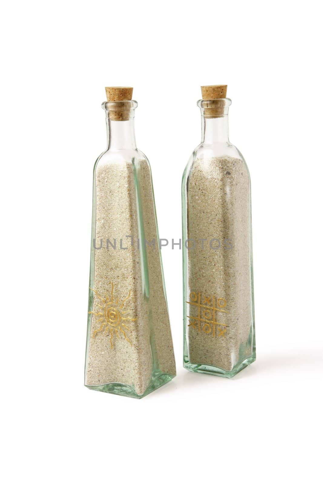 Two glass bottles full of sand