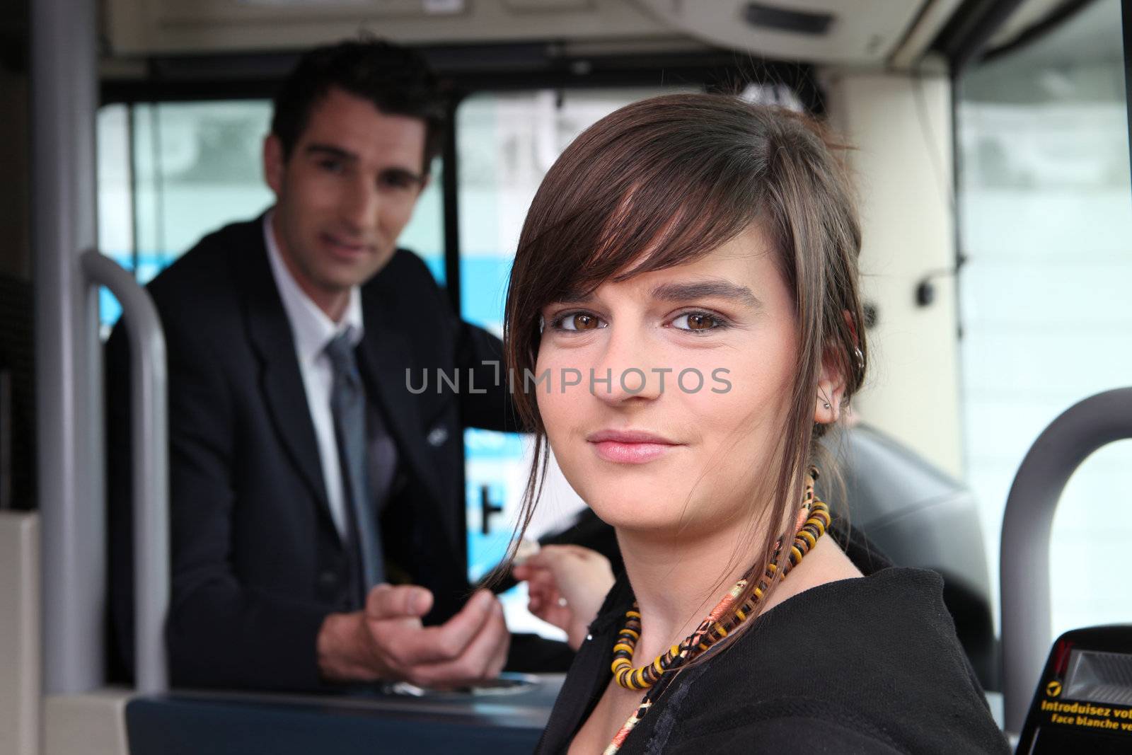 Girl sitting on the bus by phovoir