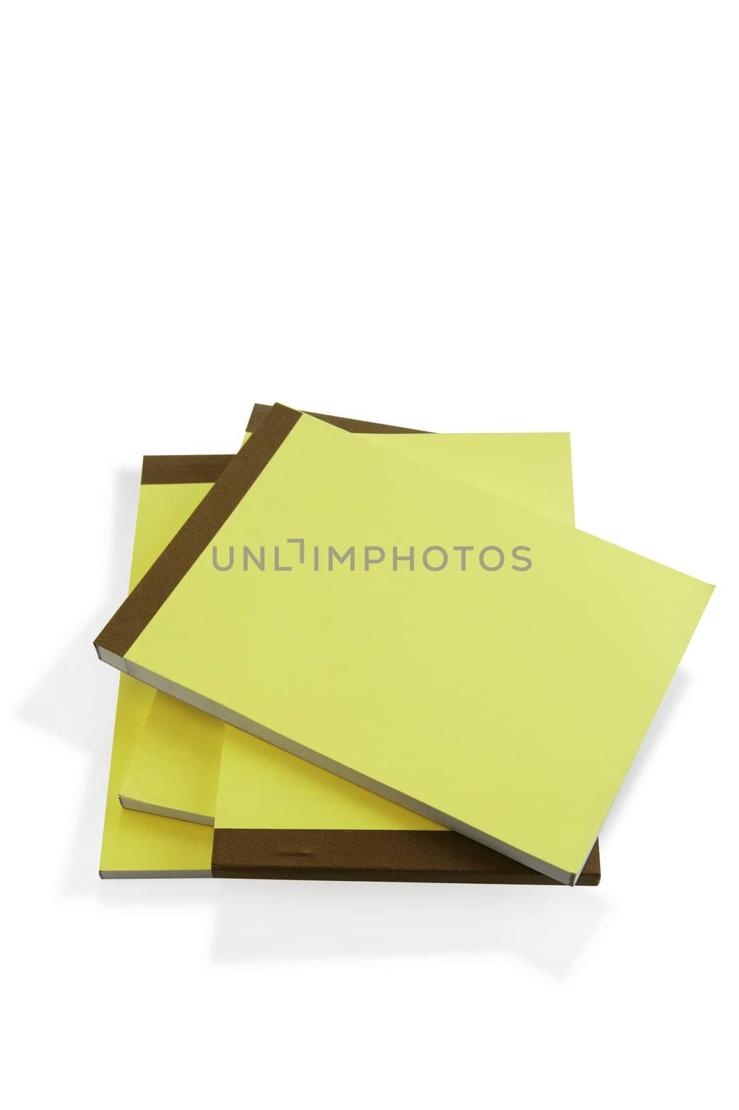 Pile of paper note pads by phovoir